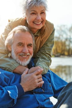 Nobody loves nature more than we do. an affectionate senior couple spending a day in nature together.