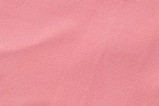 Pink linen pastel fabric texture as background.