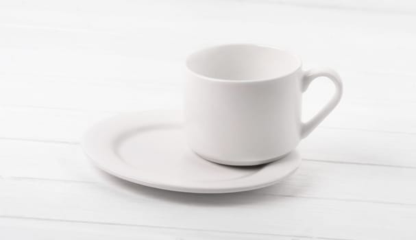 Cup standing on plate