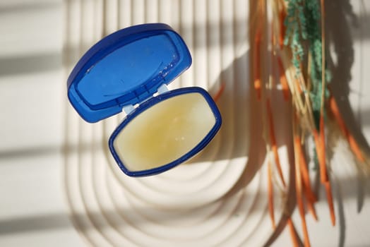 petroleum jelly in a open container with sun light
