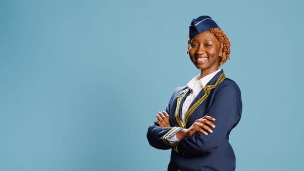 Cheerful confident woman working as stewardess