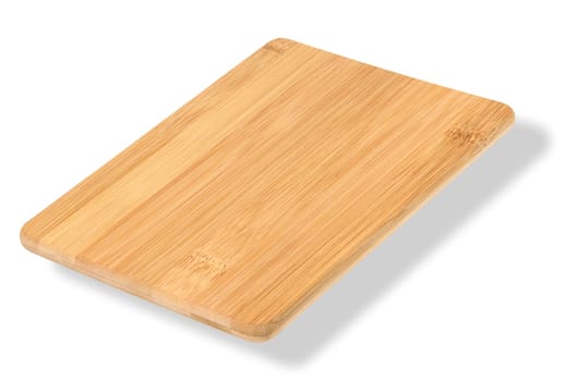 Wooden empty cutting board at an angle on a white background, kitchen utensils