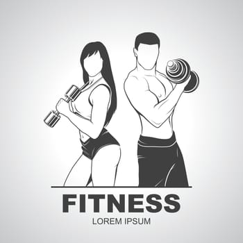 Beautiful fitness young sporty couple with dumbbells.
