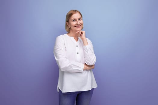 beautiful cute blond middle aged woman in white blouse in premenopausal age