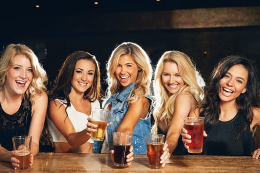 Celebrating sisterhood. young women partying in a nightclub.