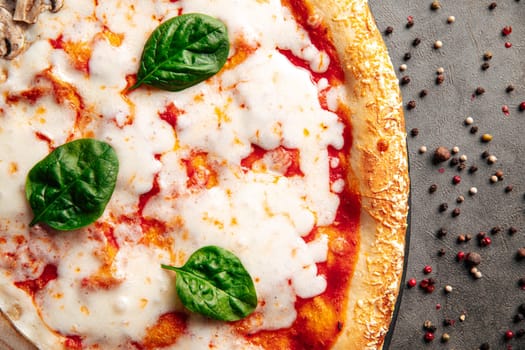 Closeup on italian margherita pizza with cheese