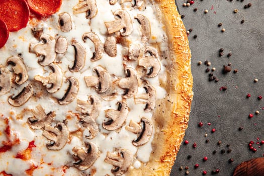 Freshly baked pizza with mushrooms and cheese