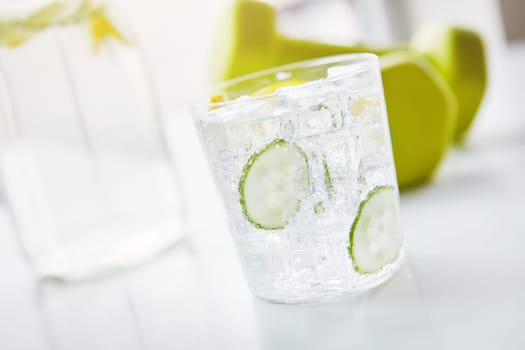 So refreshing. a glass of water with slices of lemon and cucumber in.