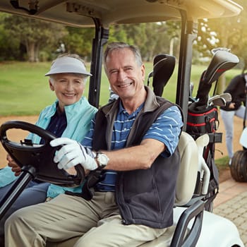 Out for a day on the green. Portrait of a smiling senior couple riding in a cart on a golf course.