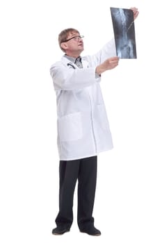 attending doctor with an x-ray of his patient.