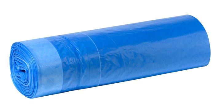 Blue plastic trash bags with strings on white background
