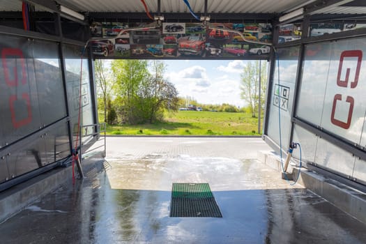 Grodno, Belarus - 28 April, 2023: The interior of the contactless self-service car wash Go