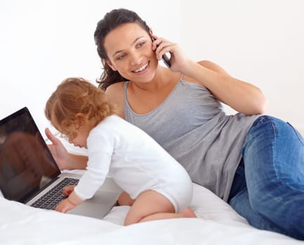 Id like to check my email...Image of a baby girl playing with her mothers laptop.