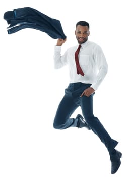 Stylish and filled with potential. A handsome young businessman jumping while isolated on white.