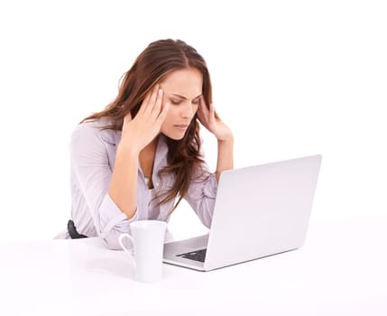 Ive got so much to do today. Stressed businesswoman with a laptop in front of her - isolated on white.