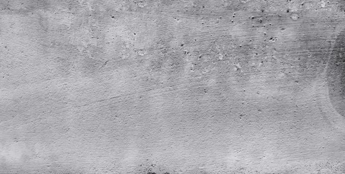 Design pattern, wall texture, plaster background. Grey and black textured wall. Abstract background.
