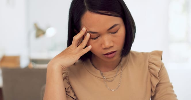 Stress, headache and asian woman on laptop in office with 404 technology glitch. Tired business worker, burnout and computer mistake with anxiety, fatigue and depression of problem, crisis and doubt