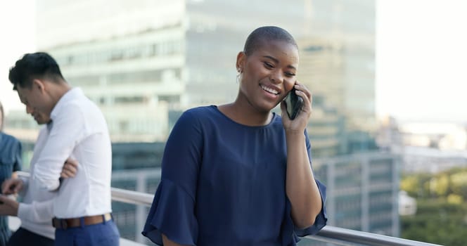 Phone call, communication and black woman at a meeting with a phone for networking, discussion and planning on a balcony. Talking, smile and employee with a mobile conversation during a work strategy.