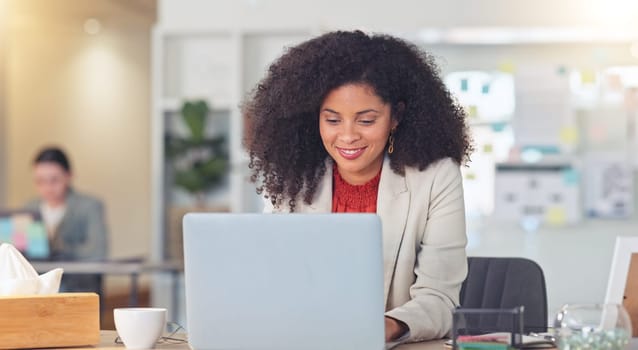 Real estate agent typing on laptop, thinking of creative property marketing advertisement to post on social media to sell a property. Confident, ambitious realtor with afro negotiating deal via email