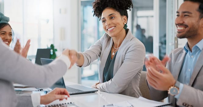 Success, handshake or happy black woman meeting company kpi goals, sales target or bonus achievement. Shaking hands, b2b deal or excited employees with applause for a worker winning a business deal