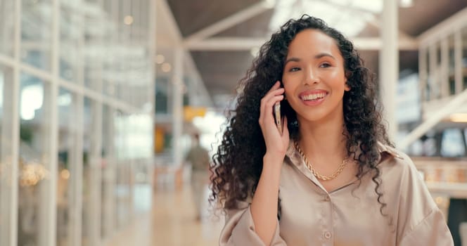 Phone call, face and happy with a business black woman in her office, talking on her mobile. Communication, networking and smile with a young female employee chatting on her smatphone at work