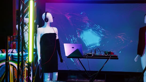 DJ mixing panel at funky nightclub