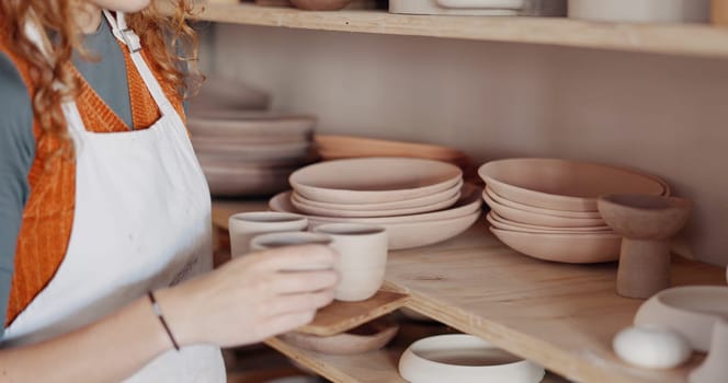 Pottery, woman artist and shelf for ceramic cups for shop, check quality for creative class or appreciate clay mold in workshop. Hobby, female entrepreneur or prepare art items to sell or for startup
