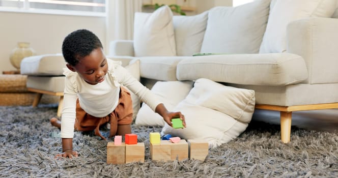 Black girl, building blocks and creative learning in family home lounge, growth and fun development. Happy african kids, educational brick toys and wood puzzle, montessori play and living room game