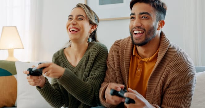Video game, fun and excited diversity couple with crazy high energy, play together and enjoy quality bonding time at home. Entertainment technology, controller and competition for happy woman and man