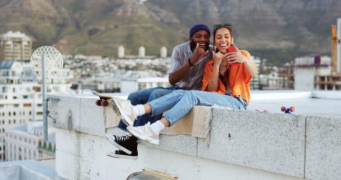 Selfie, city and interracial couple with smile on a wall during holiday in Morocco for adventure. Happy, young and black man and woman with photo on mobile during travel, vacation and summer together