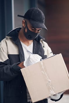 The most trustworthy track record in the service field. a masked young man delivering a package to a place of residence.