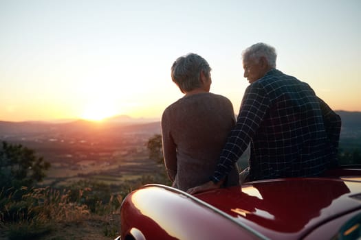 Nothing like travel to enrich your life. a senior couple enjoying a road trip.