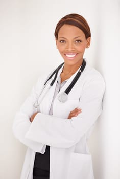My dream job. Portrait of a smiling ethnic woman doctor with her arms folded.