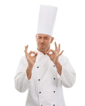 Man, chef and hands in OK sign for perfection, approval or precision isolated on white studio background. Happy culinary artist eyes closed showing okay hand gesture in perfect, precise or just right