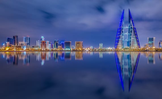 Manama, Bahrain - Beautiful reflection of Manama Cityscape with Bahrain World Trade Center taken on December 18, 2022