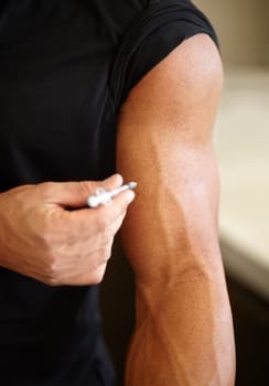 Hormone injection, steroids and an arm with medicine for health, training and energy for exercise. Strong, testosterone and a male bodybuilder injecting a supplement for fitness goals and muscle