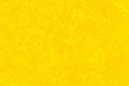Yellow concrete or cement material in abstract wall background texture.