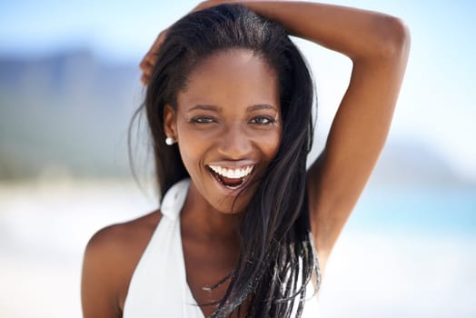 Beauty on the beach. A gorgeous africana-american woman enjoying a day at the beach