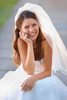 No Wedding day nerves for me. a beautiful bride laughing on her big day.