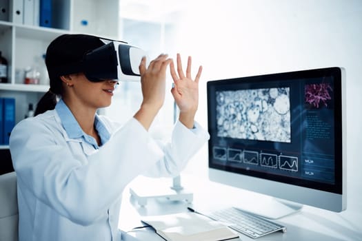 When healthcare wins, we all win. a scientist using a virtual reality headset while conducting research in a laboratory