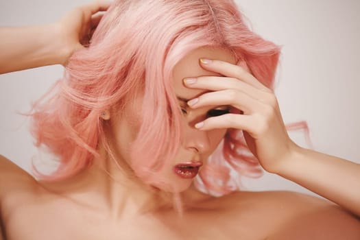 Soft-Girl with Trend Blond Pink Flying Hair, Fashion Make-up. Flying Hairstyle with Coloring.