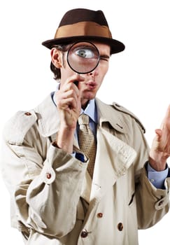 Private investigator, magnifying glass and portrait of man in studio for detective, searching and looking. Spy, investigation and male person with magnifier for secrets, information and mystery clue