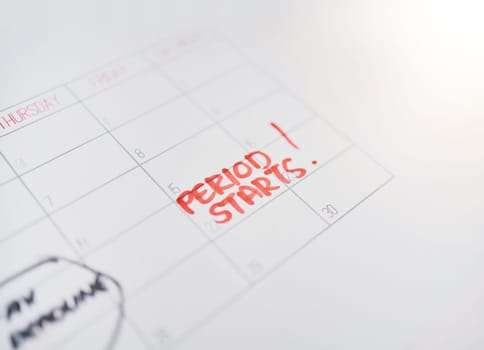 Period, cycle and note on a calendar for menstruation, monthly schedule and date for time of month. Agenda, information and reminder of an important day for health, sickness and feminine care