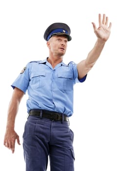 Police, stop and cop as legal professional or law enforcement with authority isolated against a studio white background. Man, gesture and officer in uniform for public service as safety or protection