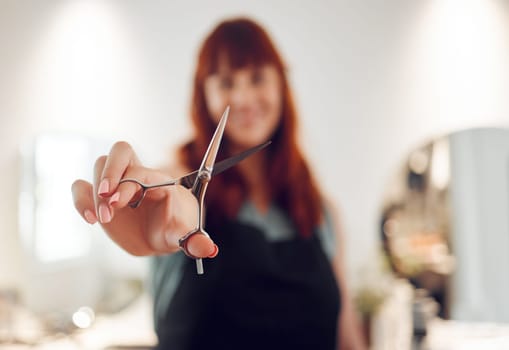 Hairdresser, salon and scissors in hands of woman for hair cut, grooming and hairdressing equipment. Portrait of stylist in startup hairdressing business ready for work, happy girl in hair salon