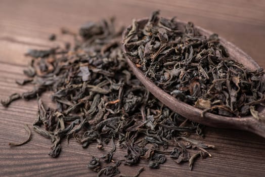 Dry herbal tea in spoon