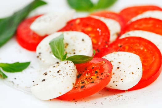 Tomato and mozzarella slices on a plate