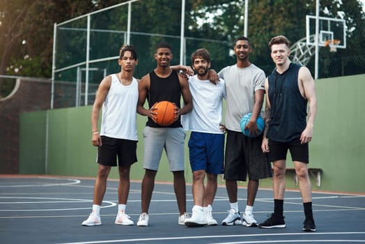 We practice winning every day. Portrait of a group of sporty young men hanging out on a basketball court.