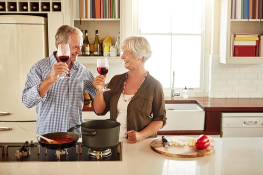 Toast, wine or happy old couple cooking food for a healthy vegan diet together with love in retirement at home. Cheers or senior woman drinking in house kitchen to celebrate with husband at dinner
