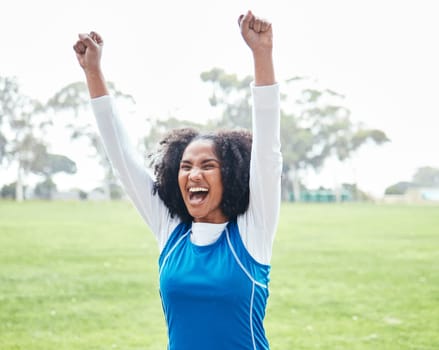 Black woman, celebration and smile for winning, success or sports victory and achievement on grass field outdoors. Happy African American female smiling and celebrating win, goal or accomplishment